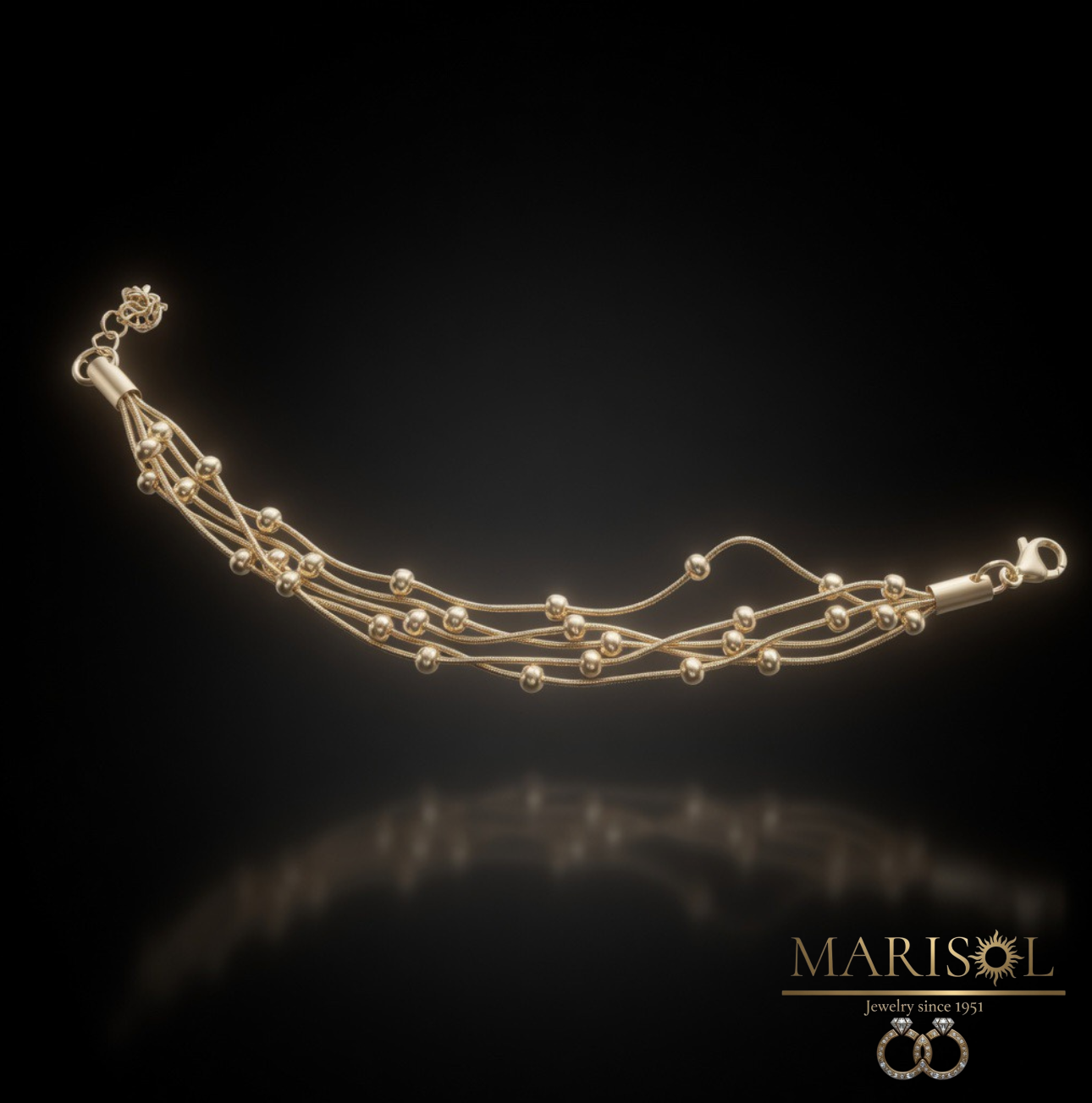 Bracciale in acciaio – Multifilo oro&nbsp;pallini